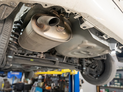 Closeup of a car's exhaust.